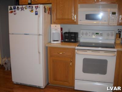 475 Nolf Road Nazareth, PA 18064 - Photo 6 of 19 a white refrigerator freezer and a stove sitting inside of a kitchen