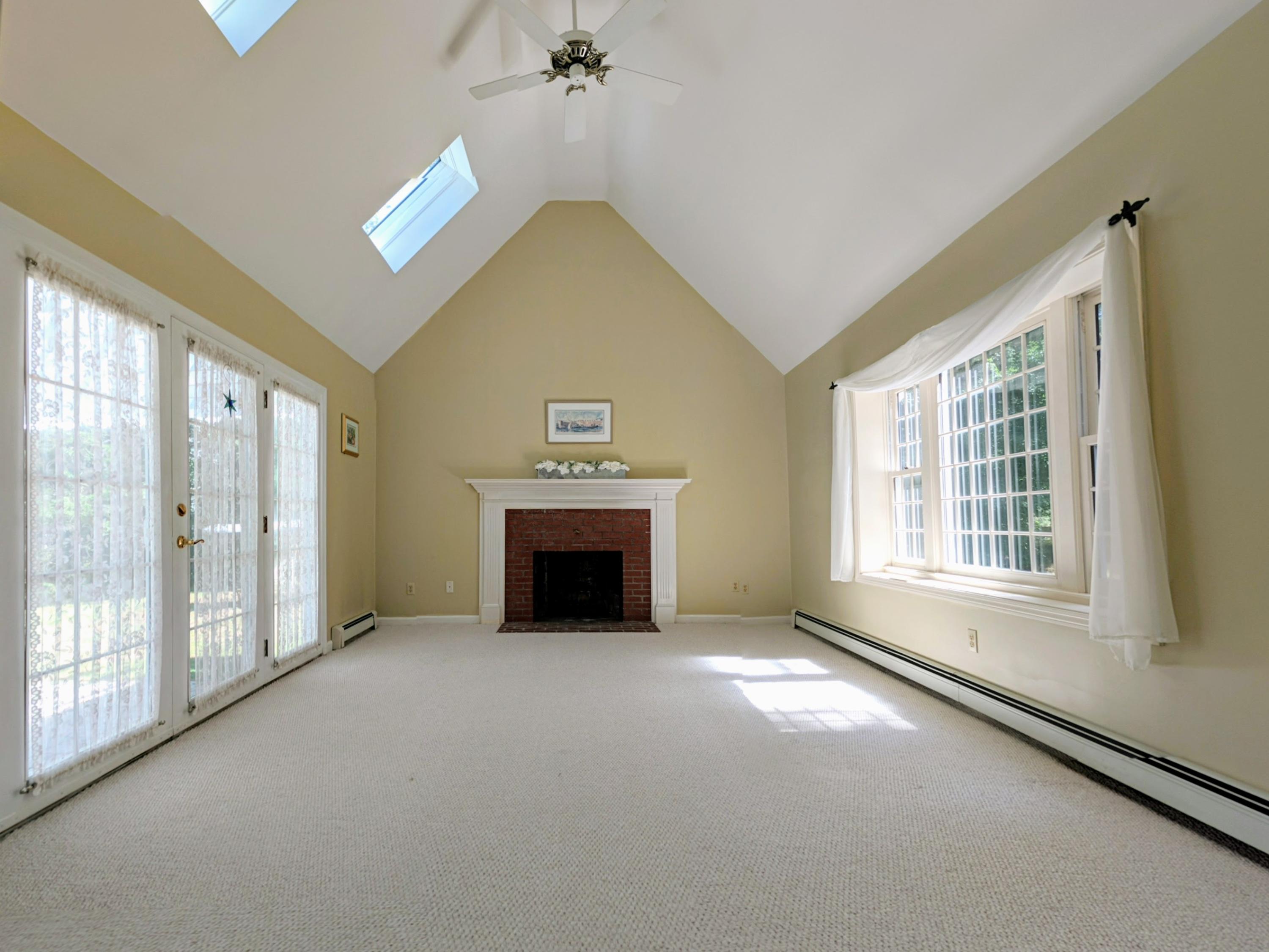 33 Highfield Drive Sandwich, MA 02563 - Photo 8 of 16 a view of an empty room with a window