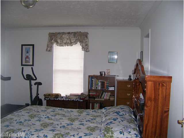401 West R Gillespie Road Dobson, NC 27017 - Photo 5 of 15 Master Bedroom.