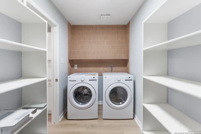 a utility room with dryer and washer