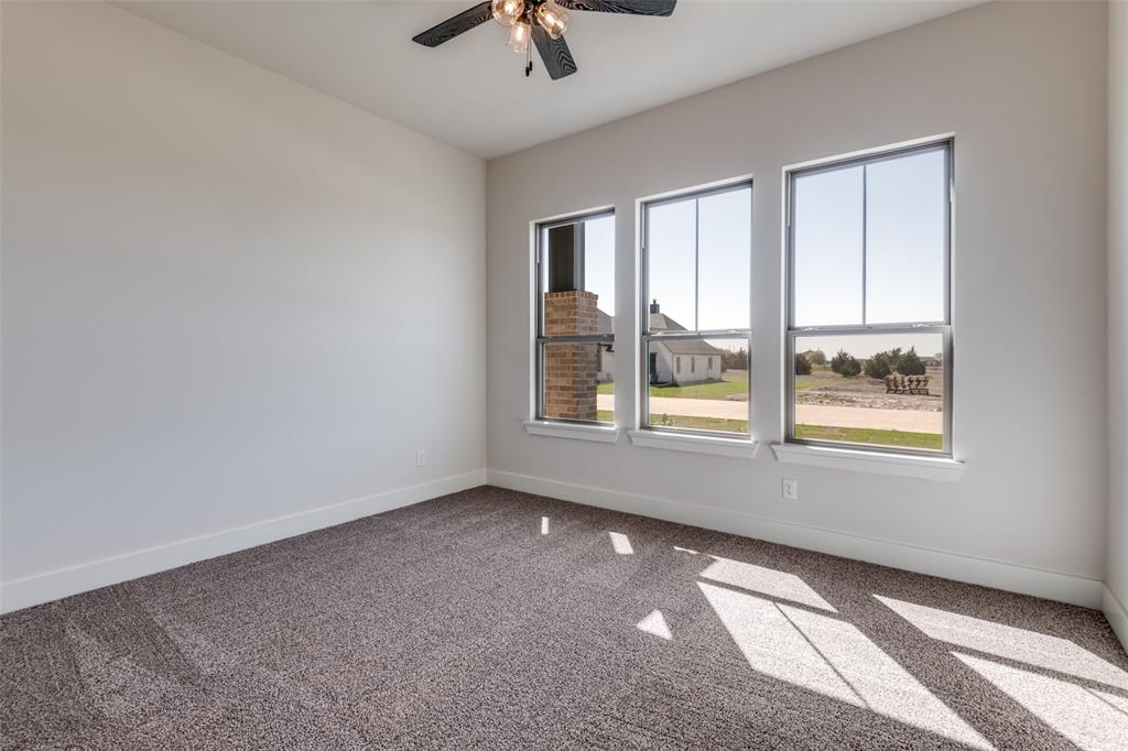 815 Evergreen Way Nevada, TX 75173 - Photo 16 of 38 an empty room with a window