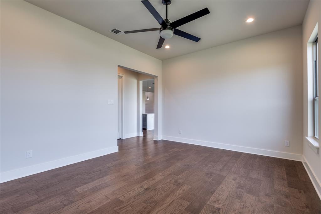 815 Evergreen Way Nevada, TX 75173 - Photo 30 of 38 a view of an empty room with a window