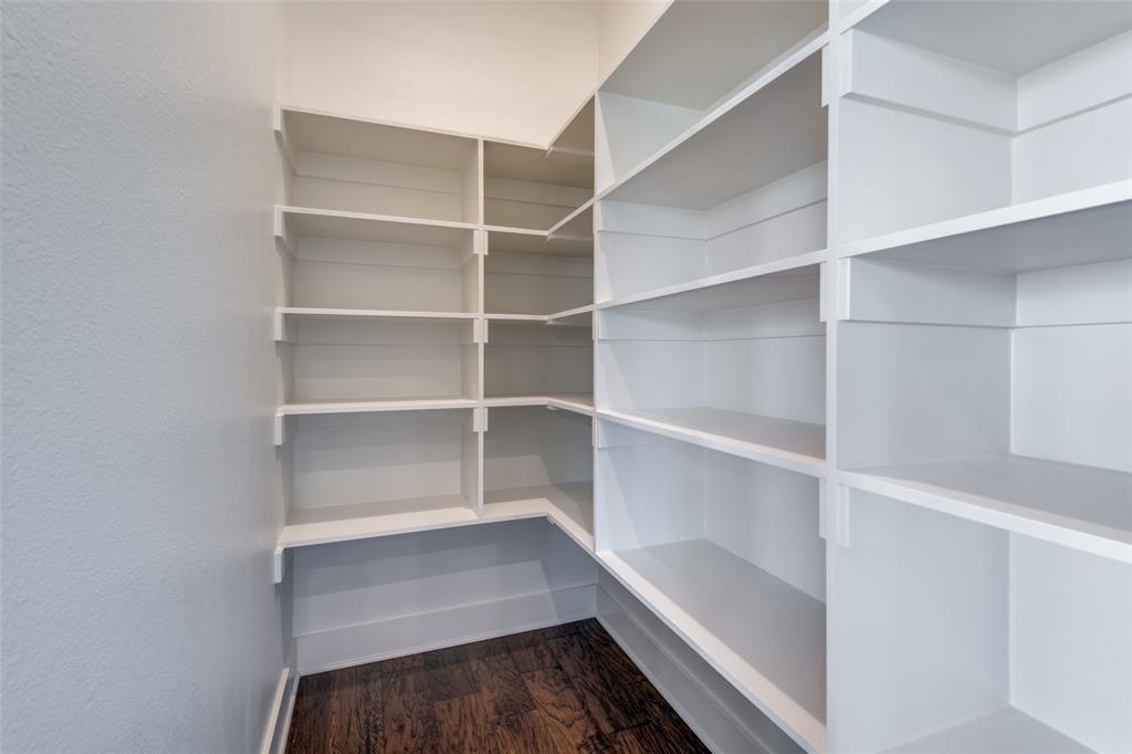 815 Evergreen Way Nevada, TX 75173 - Photo 9 of 38 a view of walk in closet with empty racks