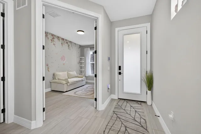 a bathroom with a tub and shower