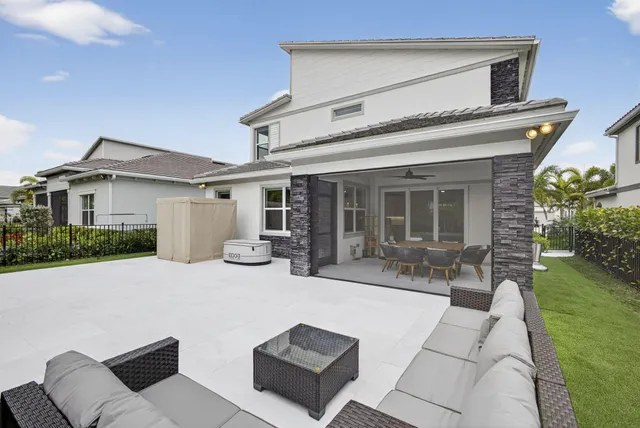 a view of house with outdoor space and porch
