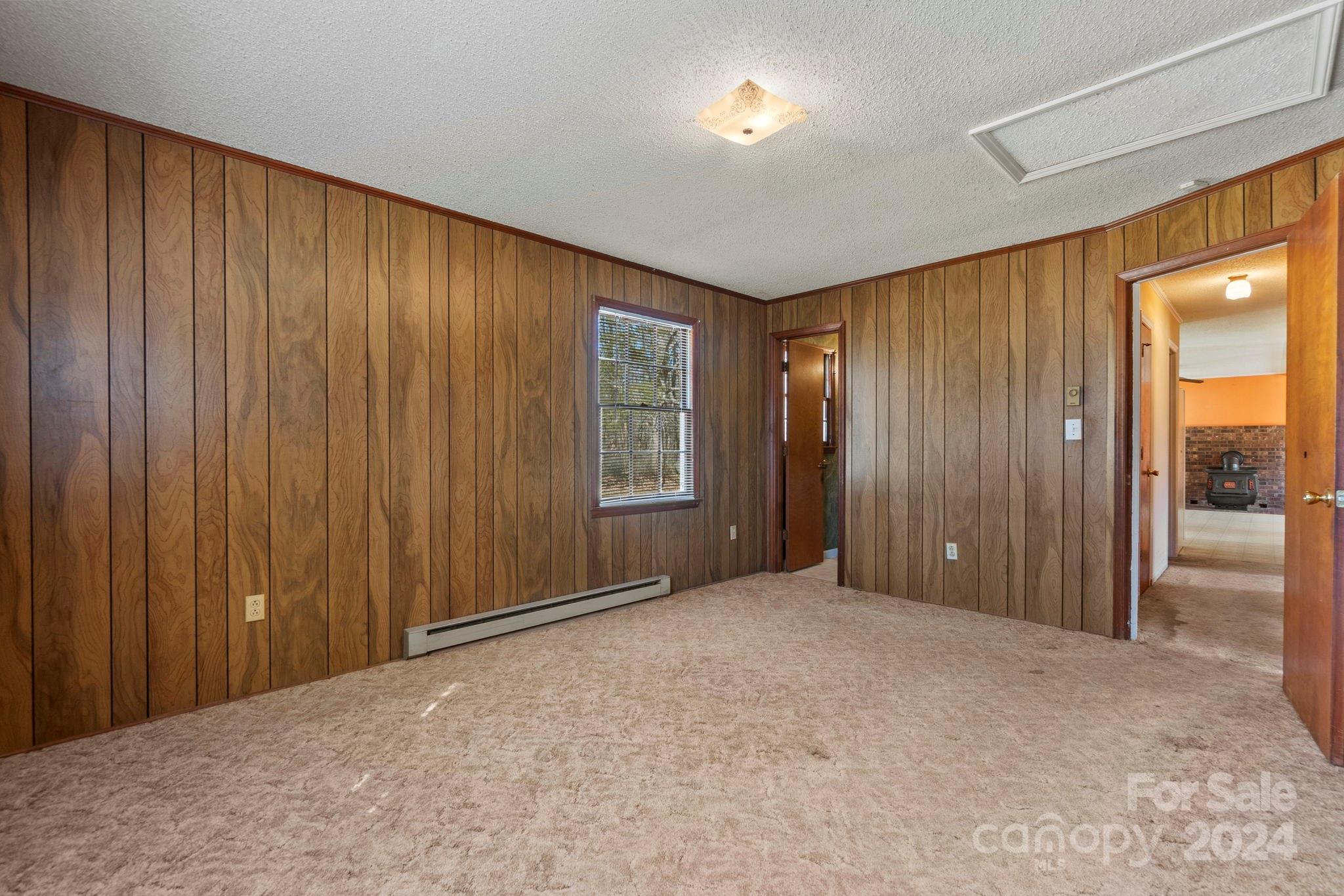 9813 Machado Drive Indian Trail, NC 28079 - Photo 11 of 27 a view of an empty room with a window