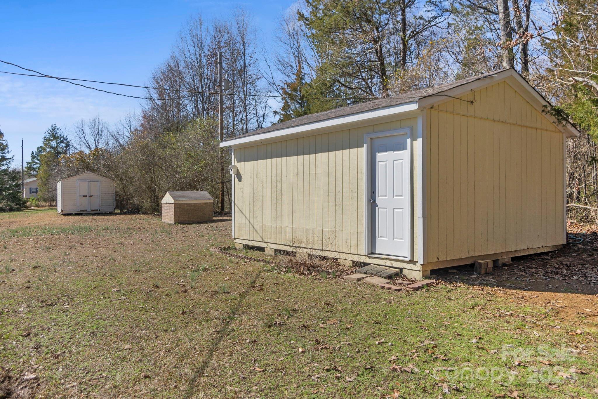 9813 Machado Drive Indian Trail, NC 28079 - Photo 15 of 27 a view of a house with backyard