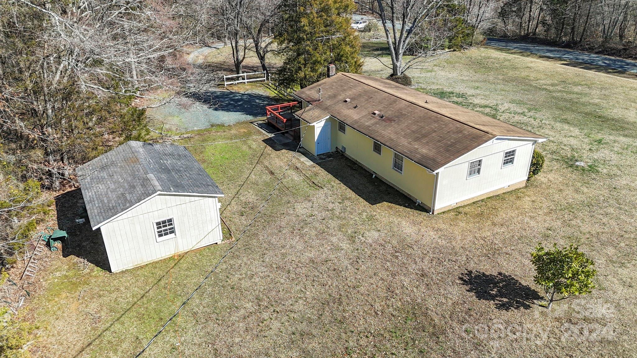 9813 Machado Drive Indian Trail, NC 28079 - Photo 20 of 27 a view of a house with a yard