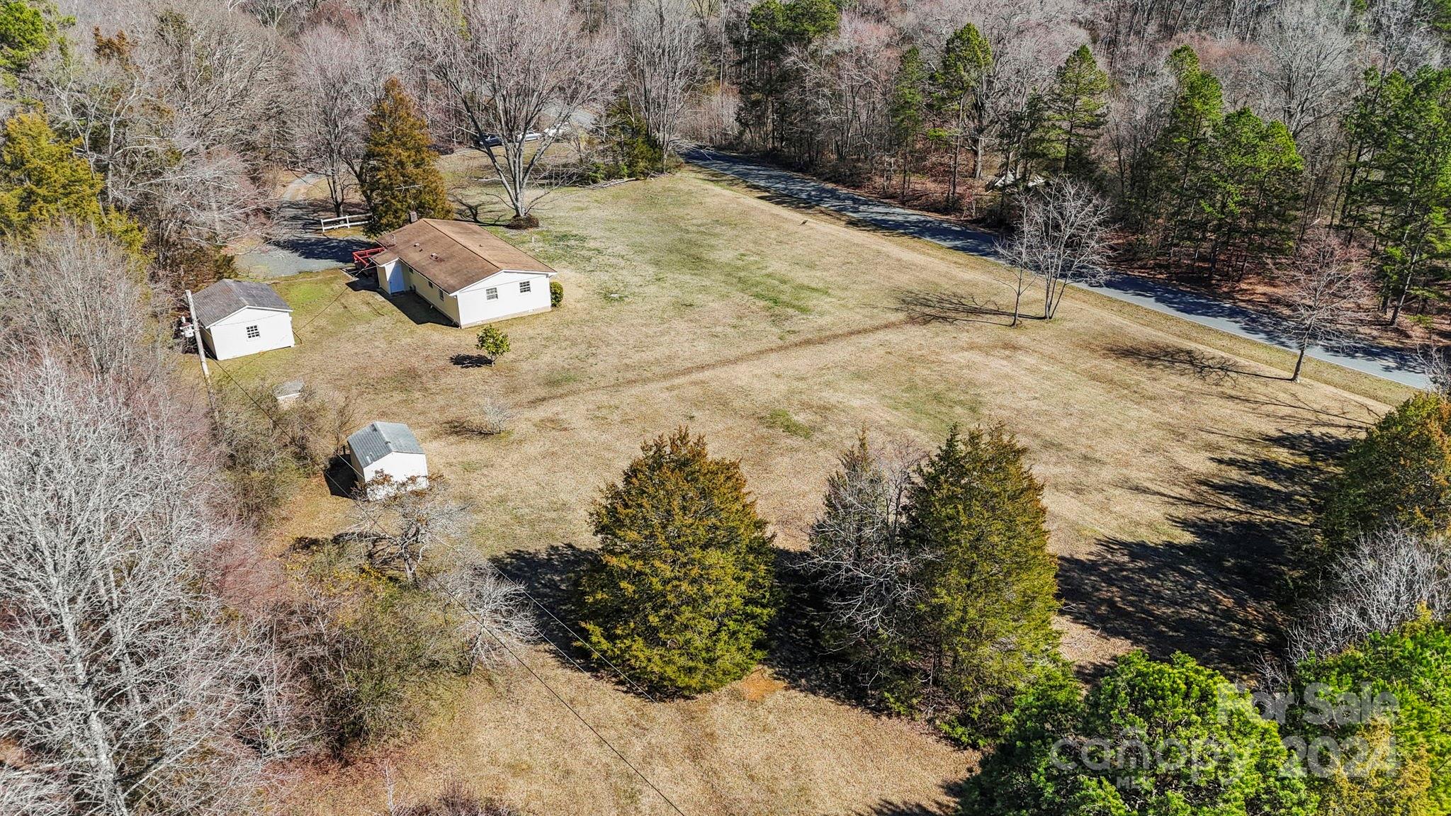 9813 Machado Drive Indian Trail, NC 28079 - Photo 21 of 27 a view of outdoor space and yard