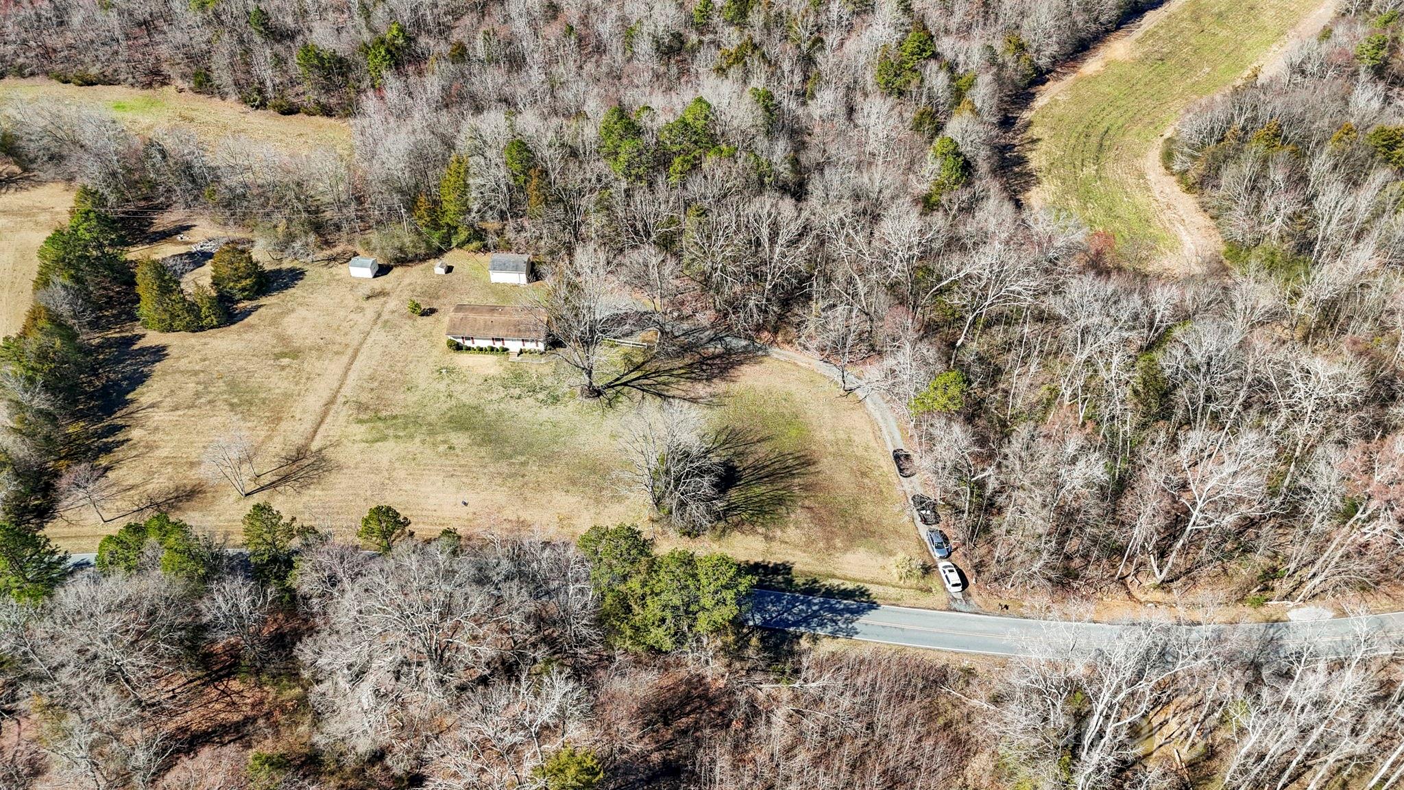 9813 Machado Drive Indian Trail, NC 28079 - Photo 24 of 27 a view of a yard with trees