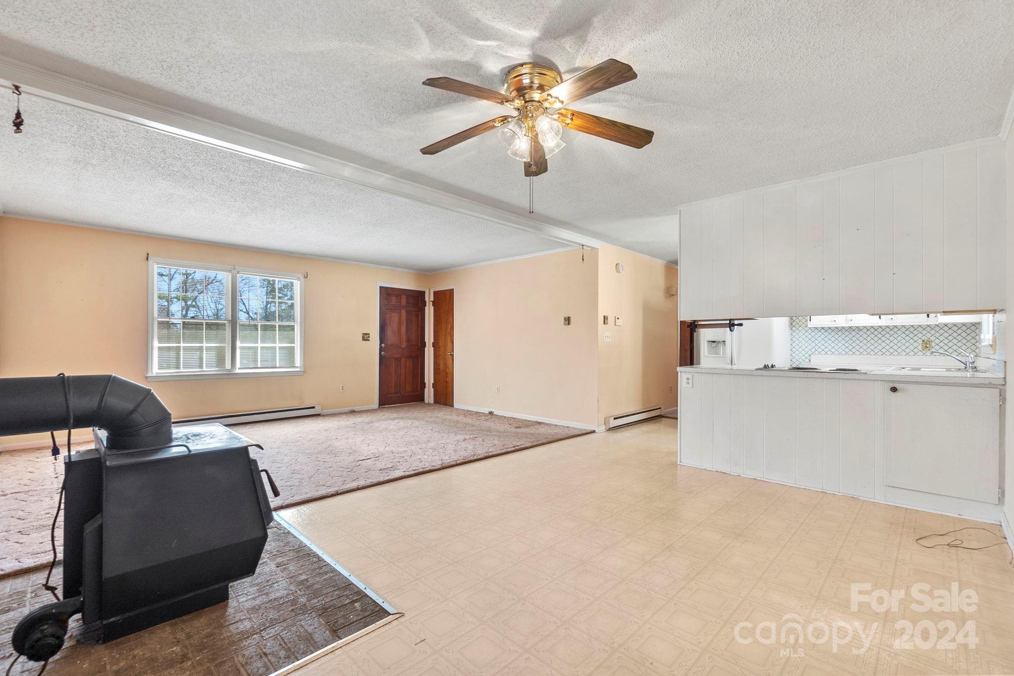 9813 Machado Drive Indian Trail, NC 28079 - Photo 8 of 27 a living room with furniture and a window