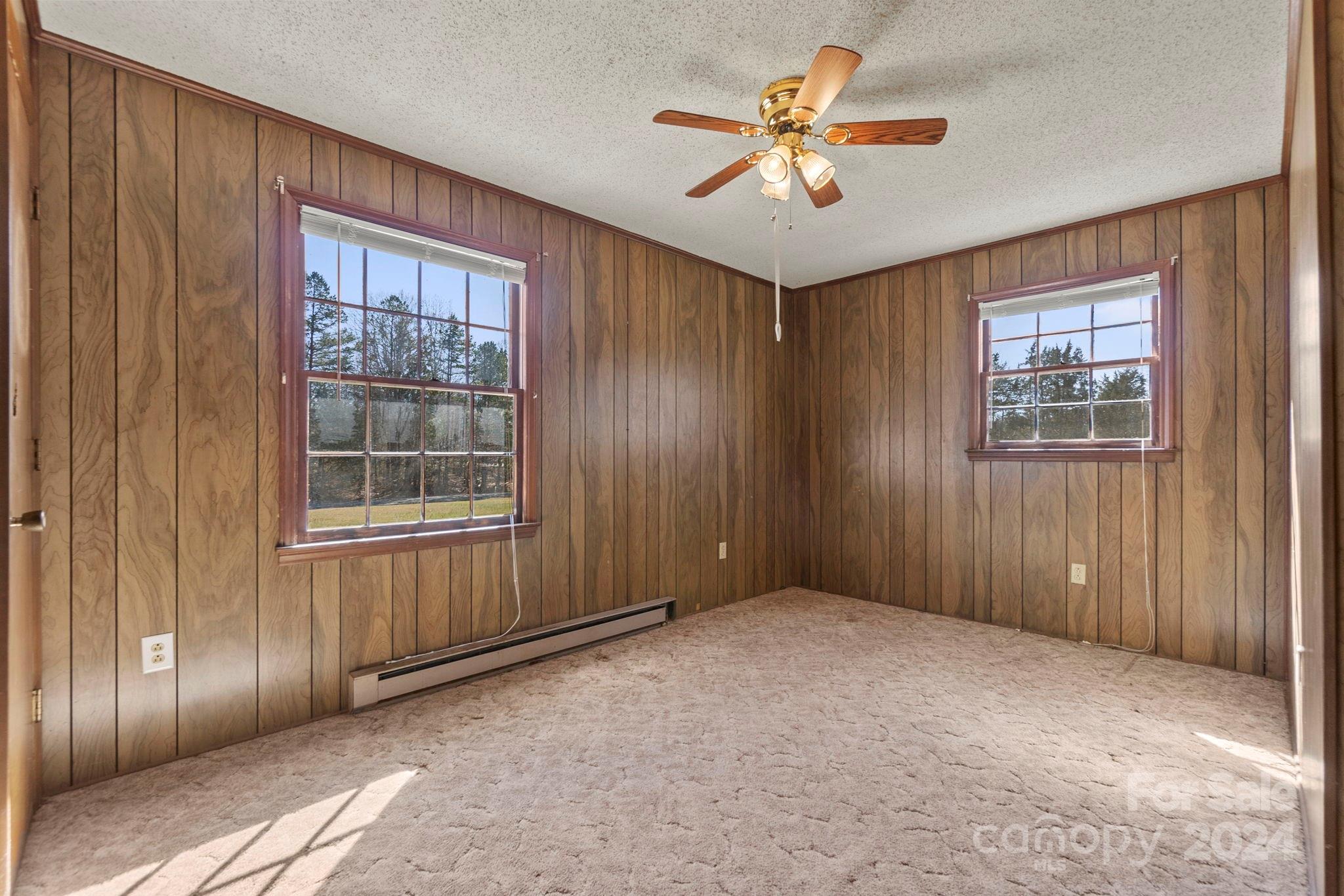 9813 Machado Drive Indian Trail, NC 28079 - Photo 10 of 27 an empty room with windows and closet