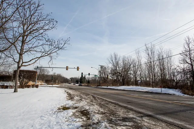 a view of road with with cars
