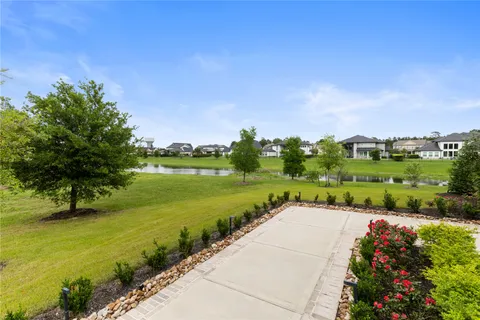 a view of a lake with a garden