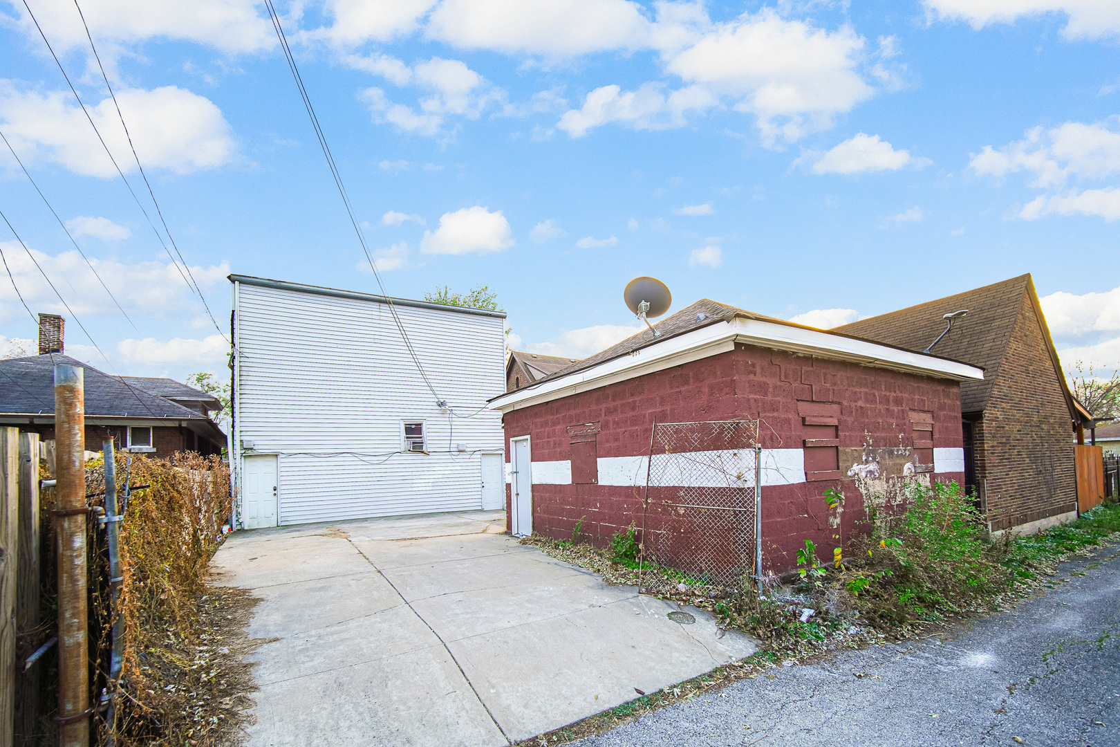 511 3rd Avenue Joliet, IL 60433 - Photo 29 of 30 a front view of a building with a yard