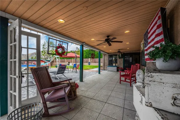 view of house with outdoor space and sitting area