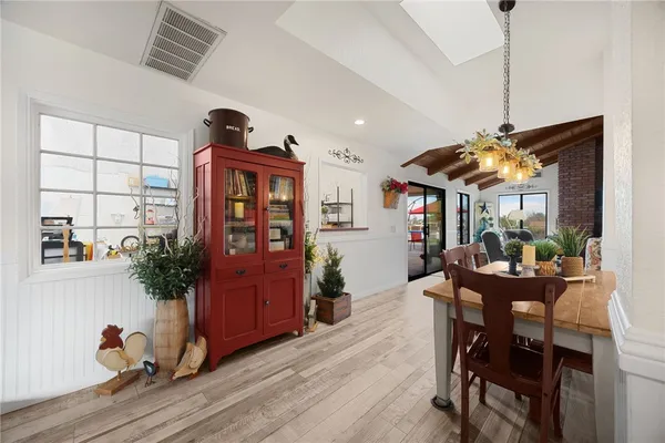 a kitchen with stainless steel appliances granite countertop a refrigerator and stove top oven