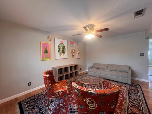 a bedroom with furniture and a bed