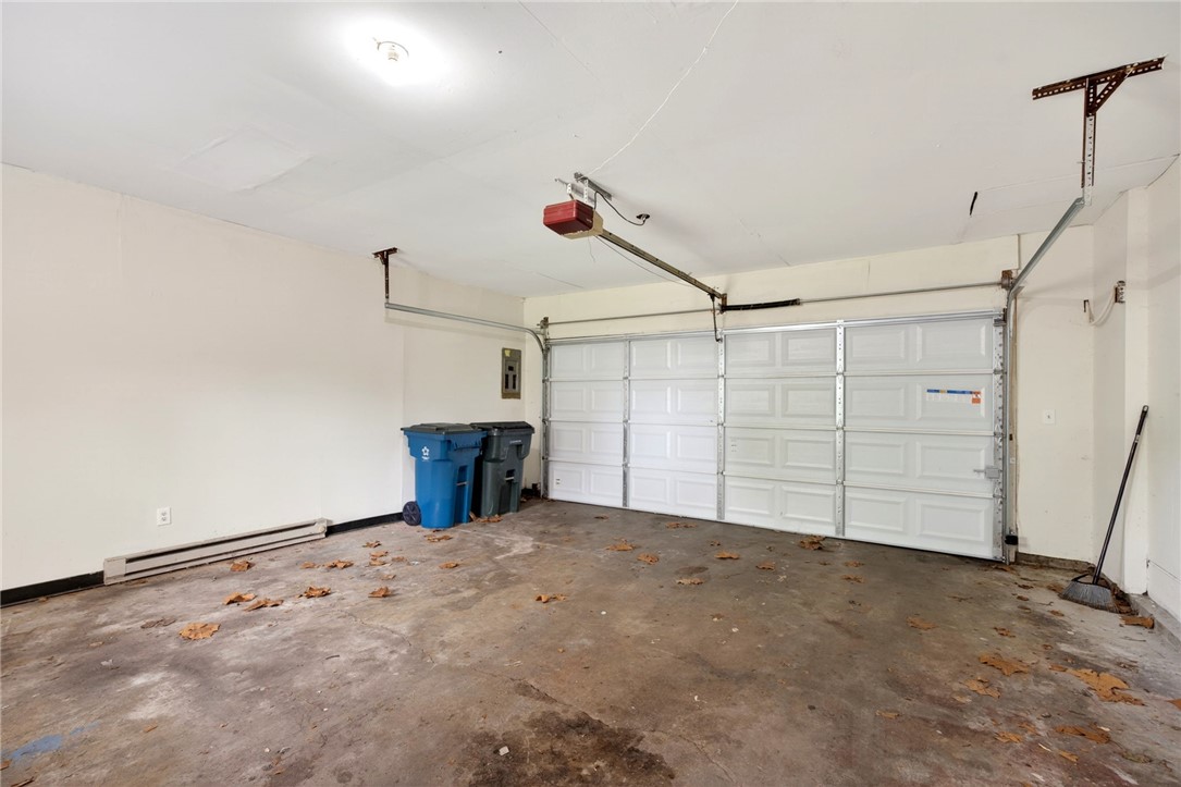 3659 Trail-On Road Dayton, OH 45439 - Photo 27 of 38 This spacious garage offers practical storage and parking solutions for modern living.