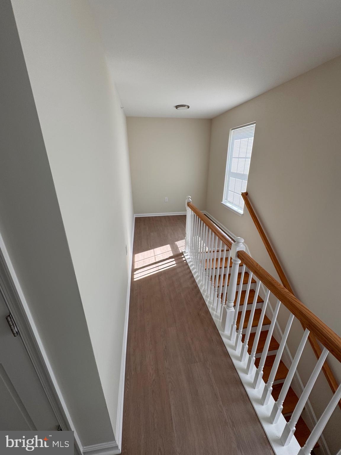 638 Douglas Street Cambridge, MD 21613 - Photo 14 of 30 a view of a hallway with wooden floor and entryway
