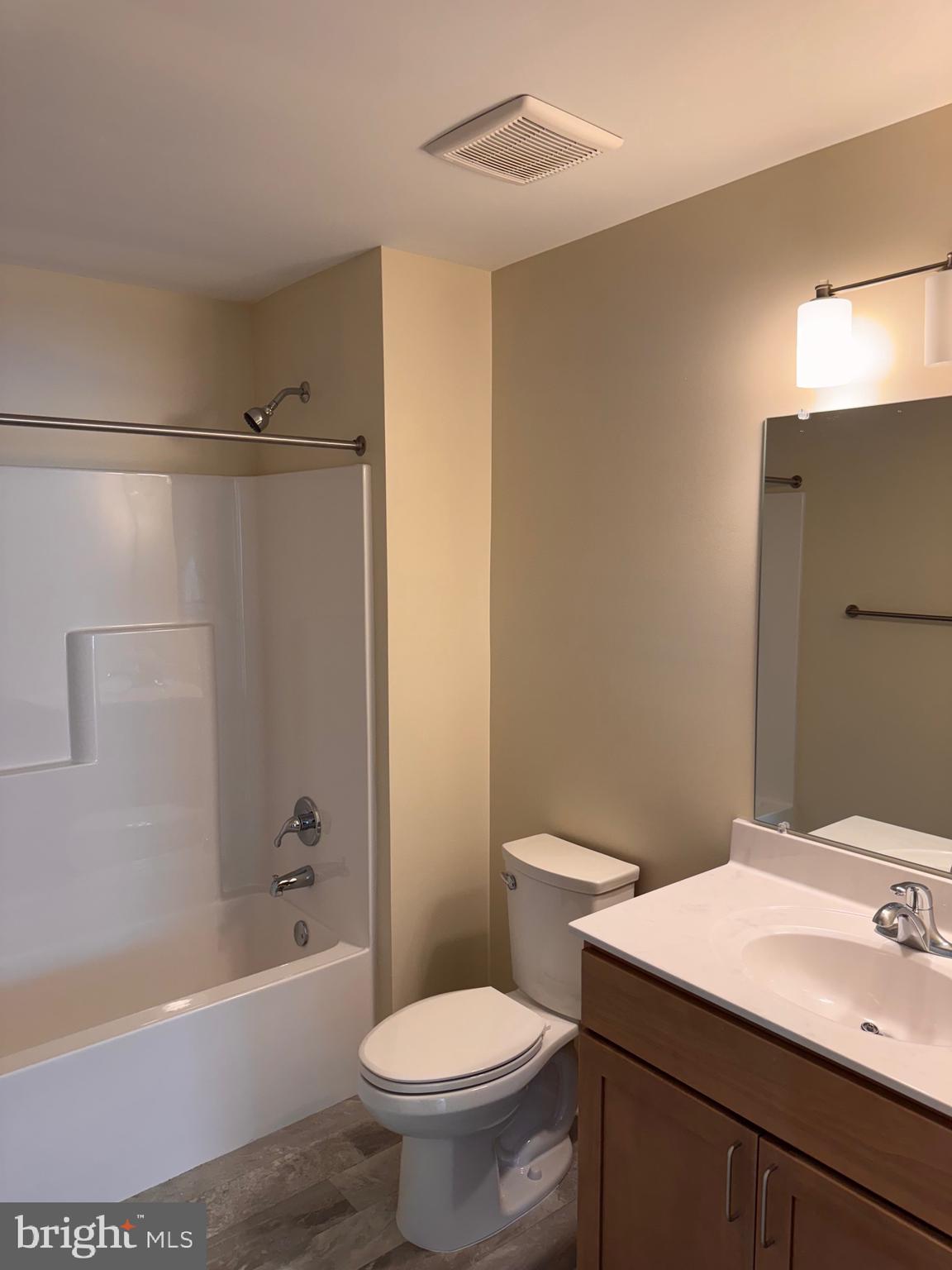 638 Douglas Street Cambridge, MD 21613 - Photo 20 of 30 a bathroom with a sink toilet and shower