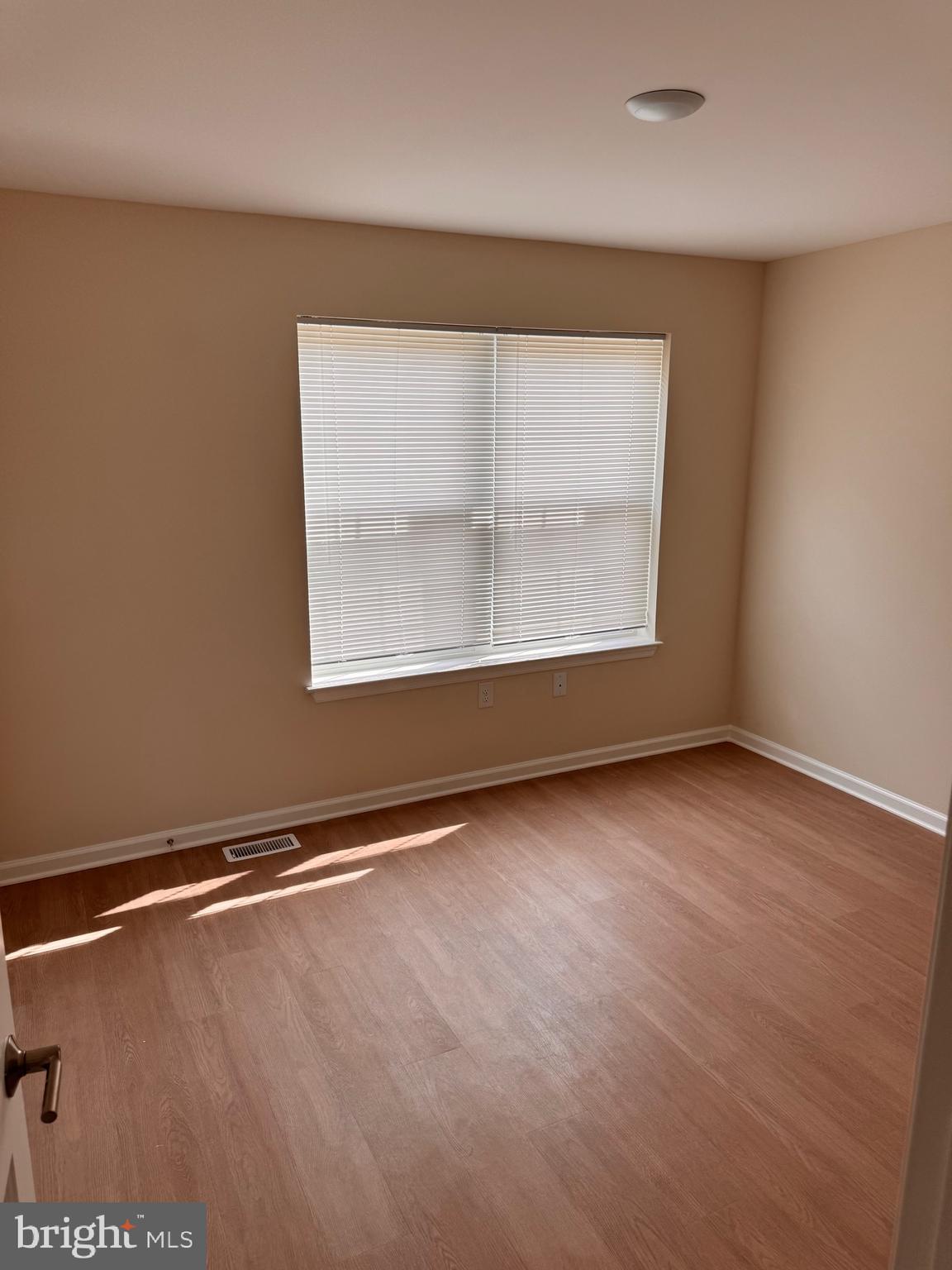 638 Douglas Street Cambridge, MD 21613 - Photo 21 of 30 an empty room with a window