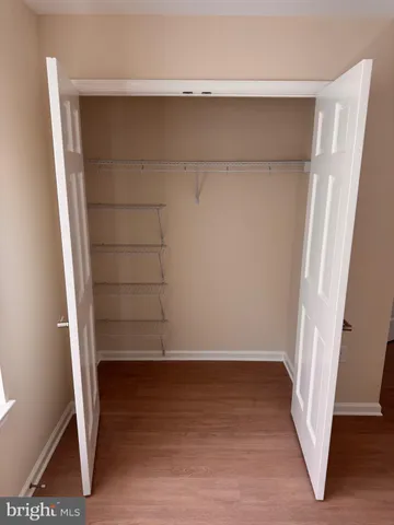 an empty room with a empty space and window