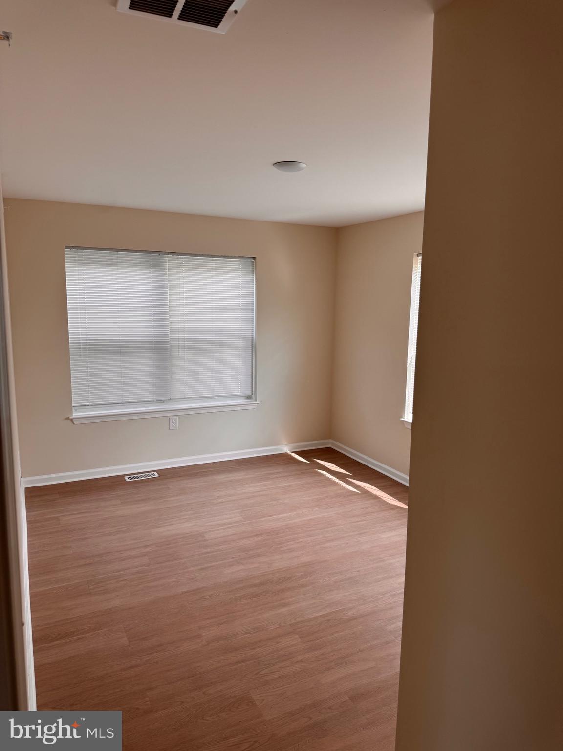 638 Douglas Street Cambridge, MD 21613 - Photo 25 of 30 an empty room with a empty space and window