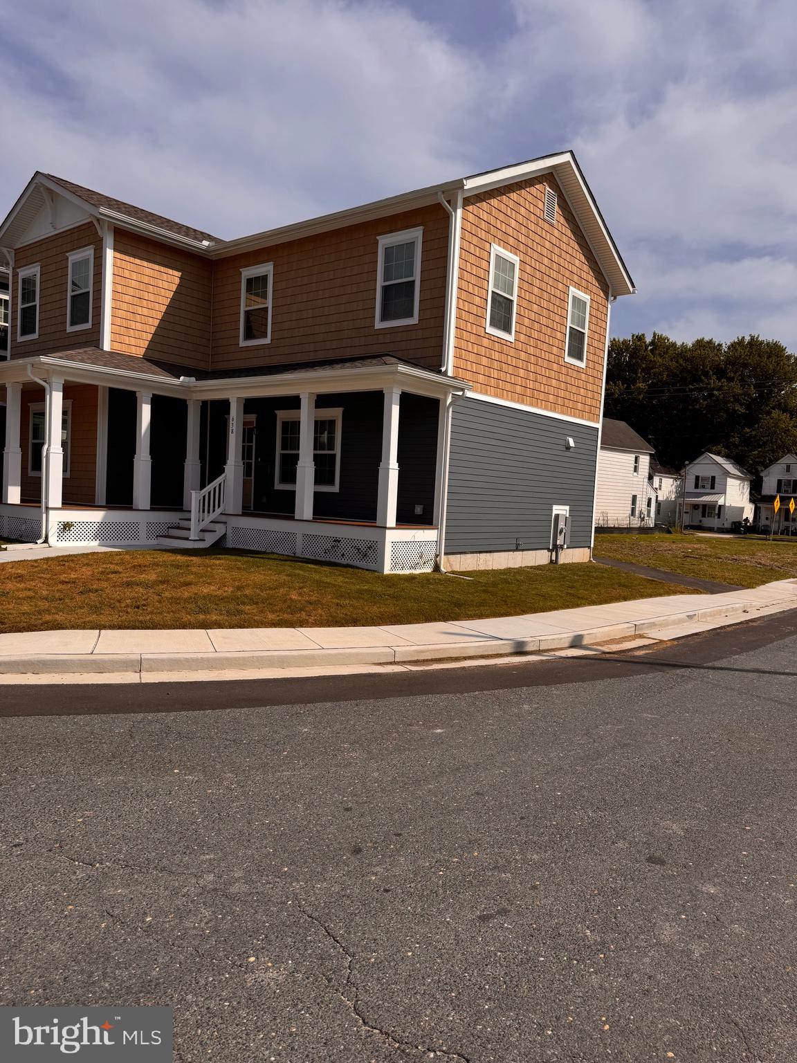 638 Douglas Street Cambridge, MD 21613 - Photo 27 of 30 a view of house with yard and ocean view