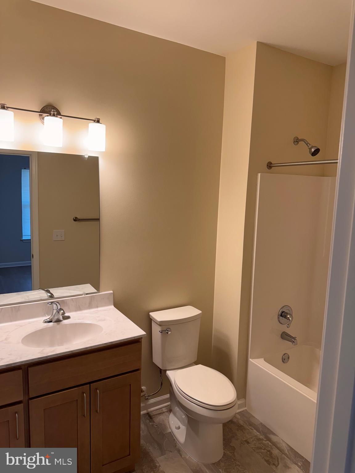 638 Douglas Street Cambridge, MD 21613 - Photo 8 of 30 a bathroom with a sink toilet and shower