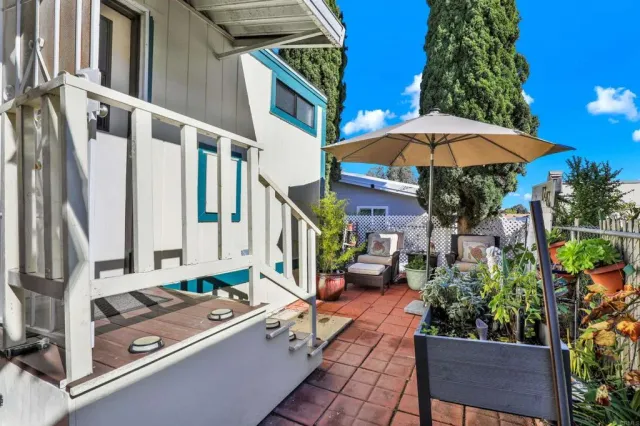 a view of balcony with an outdoor dining space