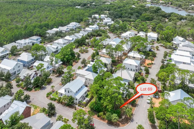 an aerial view of a red and white house