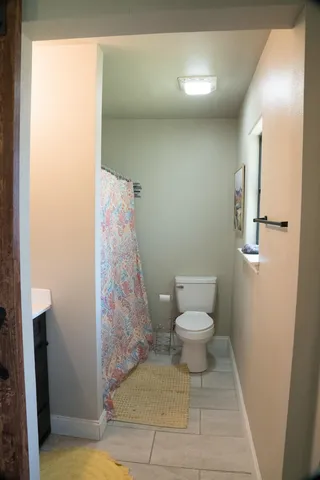 a bathroom with a toilet