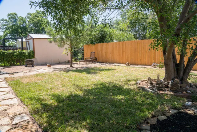 a house with trees in front of it