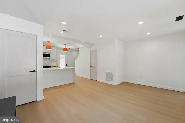 a view of workspace with furniture and window