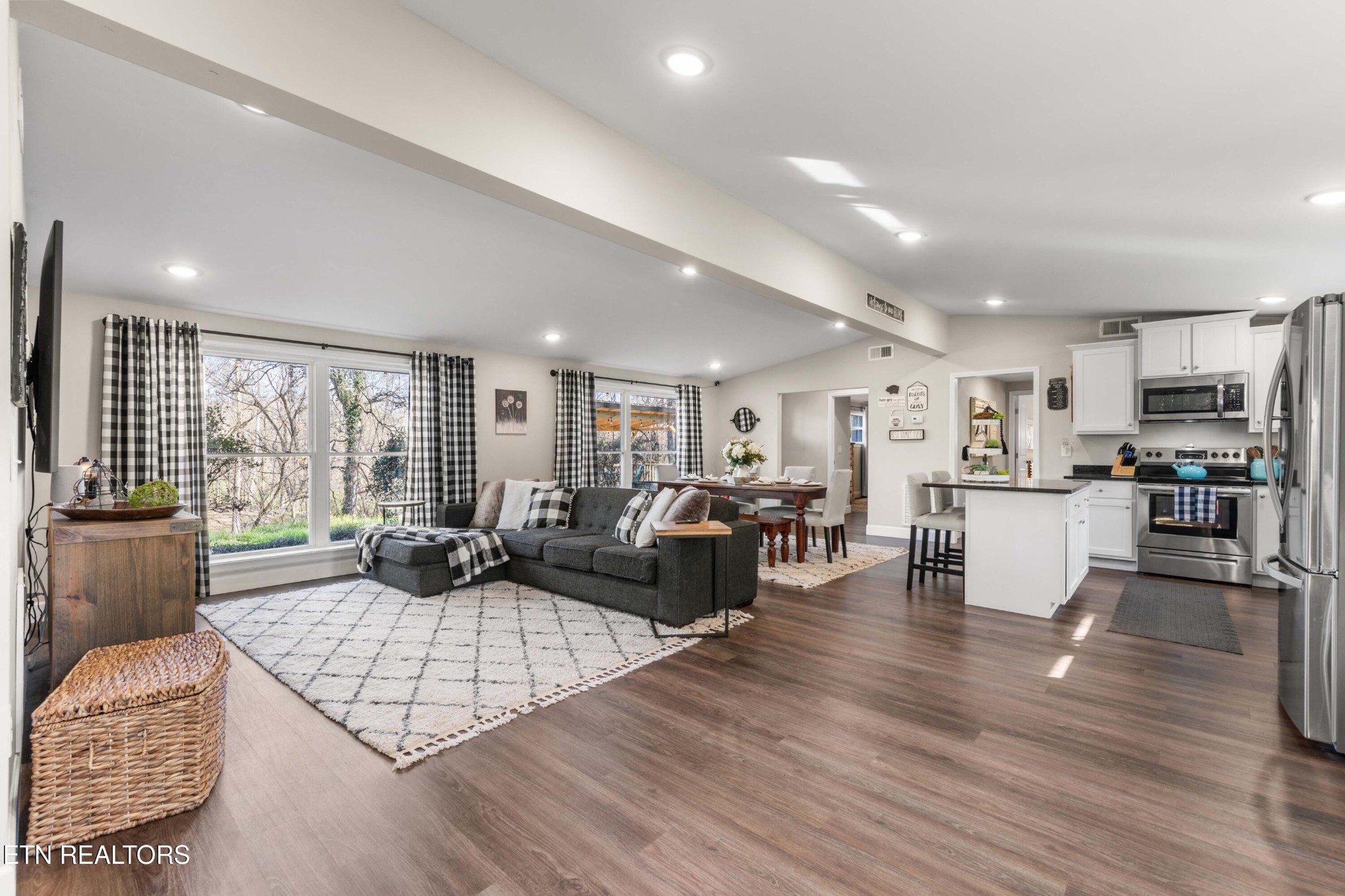 507 Short Street Athens, TN 37303 - Photo 28 of 54 a living room with furniture hard wood floor and a kitchen