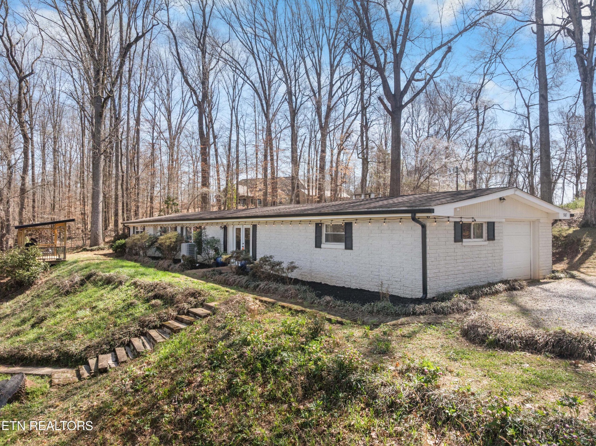 507 Short Street Athens, TN 37303 - Photo 48 of 54 a white house with a large tree in front of it