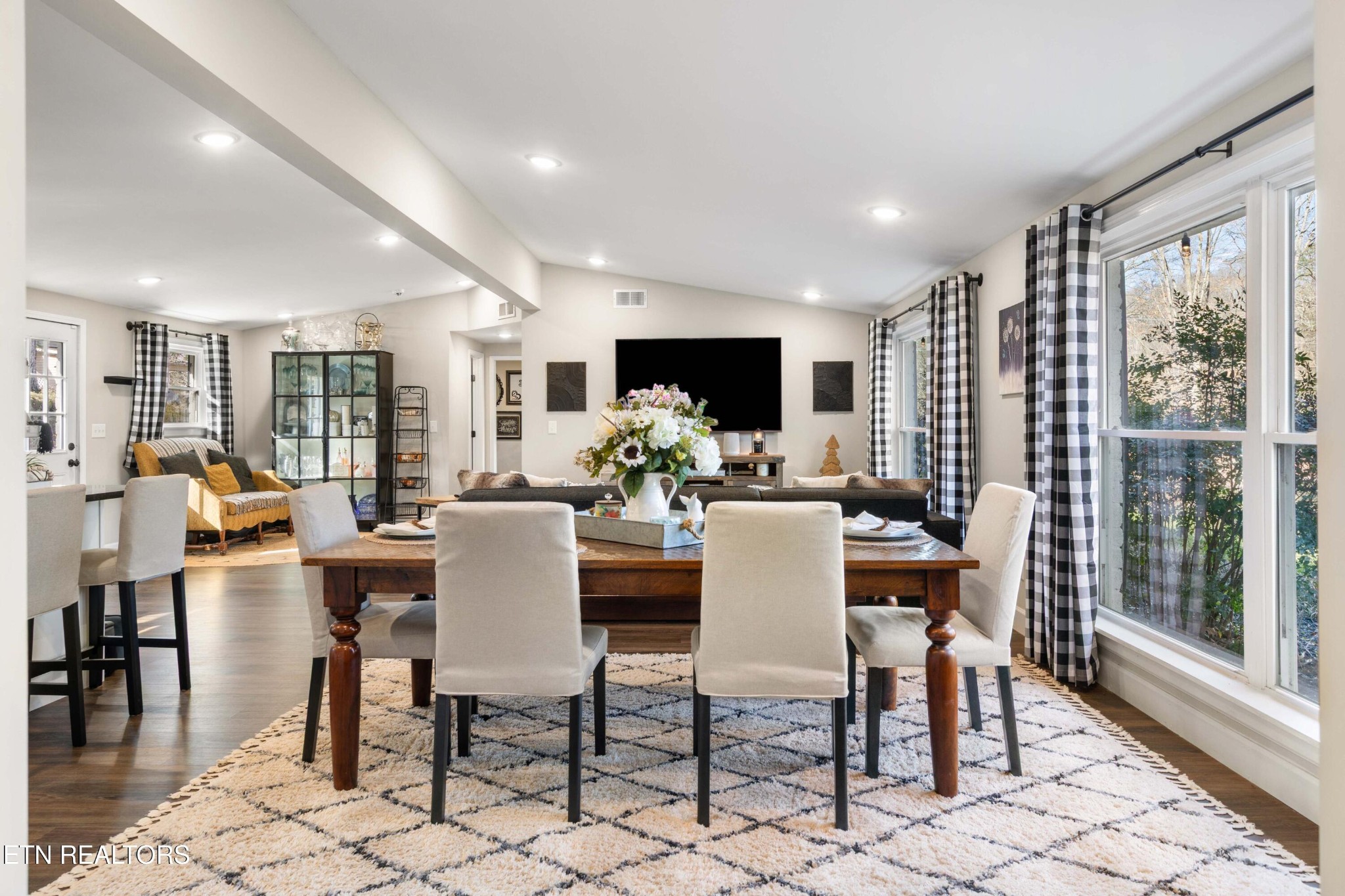 507 Short Street Athens, TN 37303 - Photo 5 of 54 a dining room with furniture a rug and a floor to ceiling window