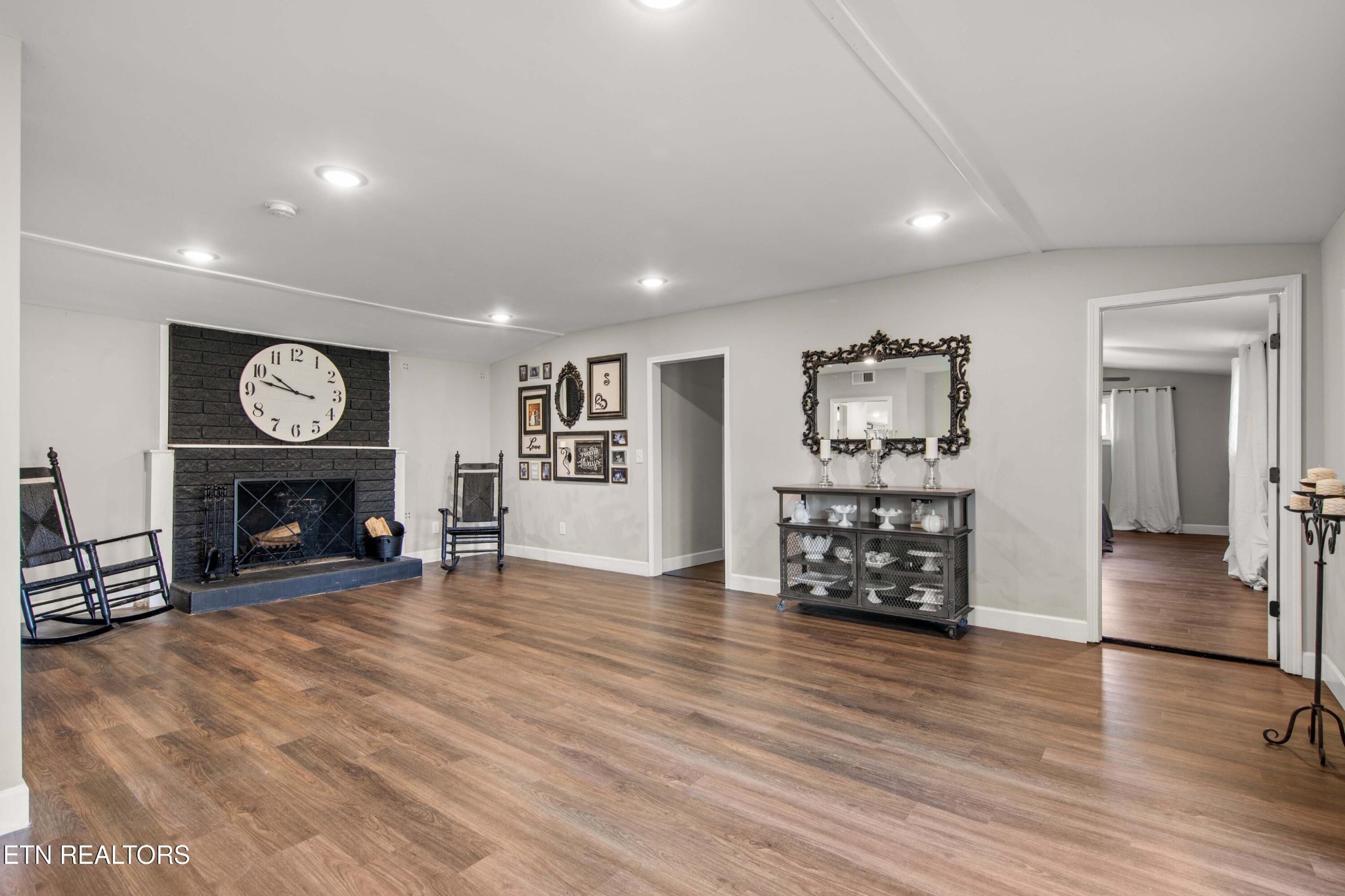 507 Short Street Athens, TN 37303 - Photo 9 of 54 an empty room with furniture and a fireplace