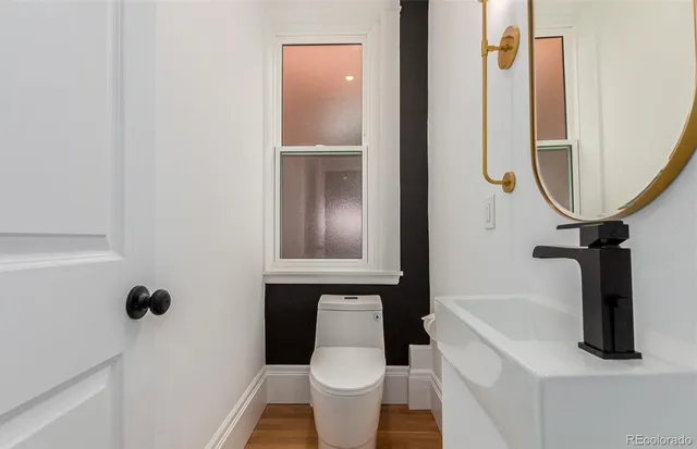 a view of a bathroom with a shower and a sink
