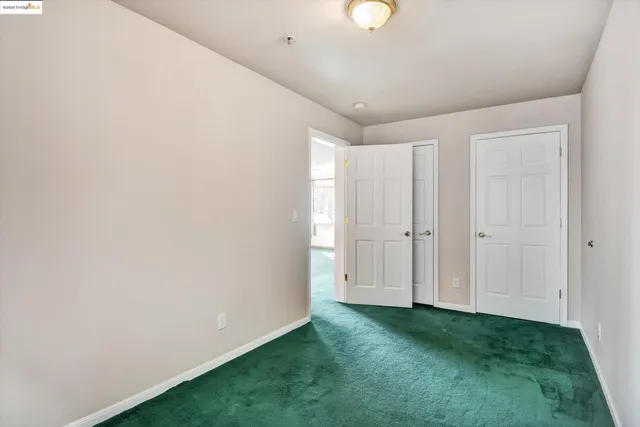 a view of entryway with kitchen