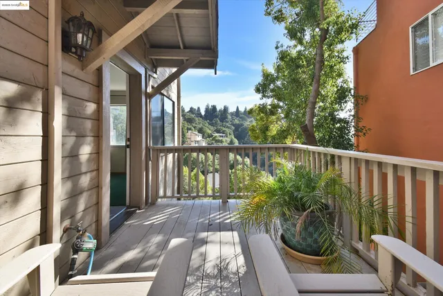 a view of balcony with furniture