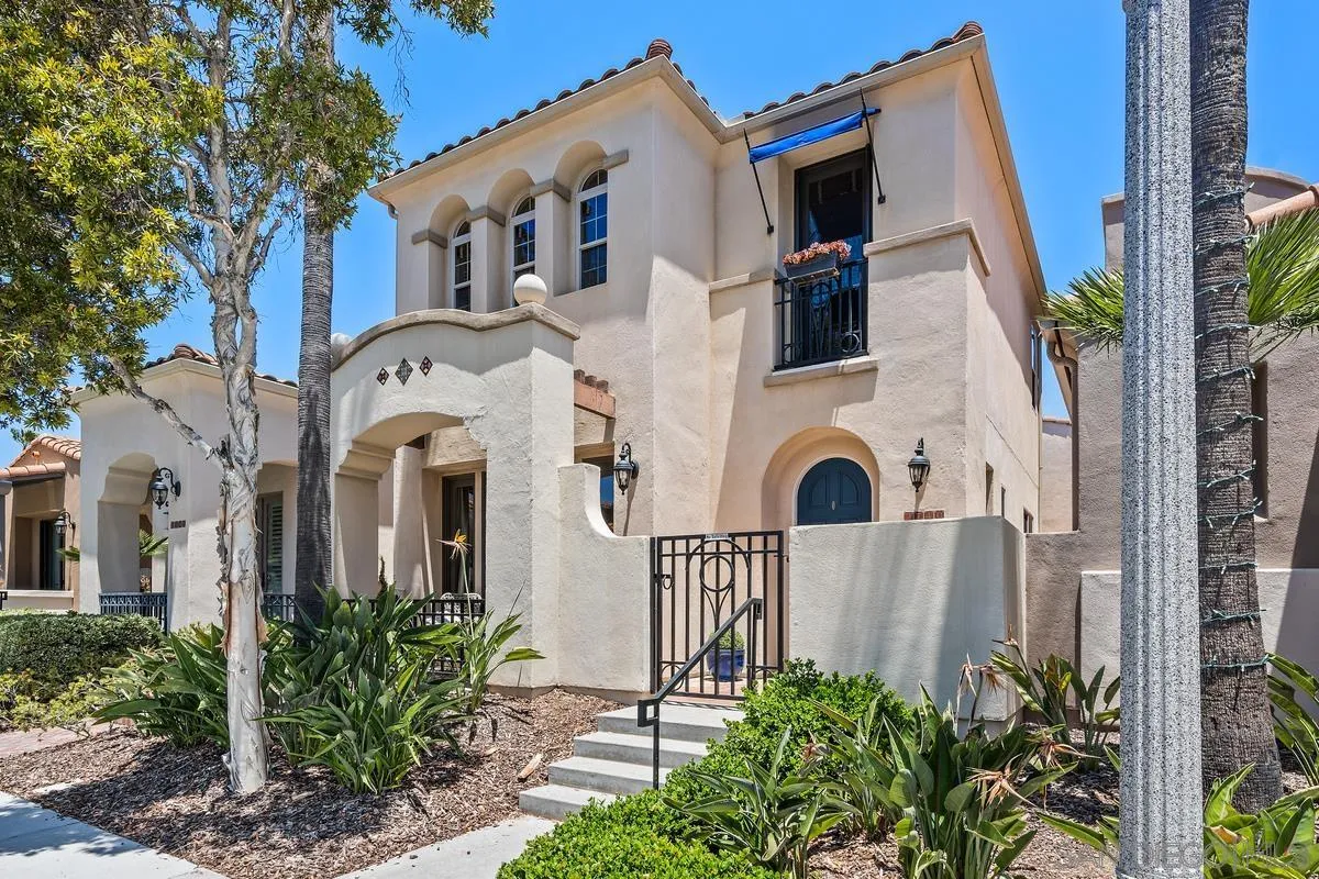 2740 East Bainbridge Road San Diego, CA 92106 - Photo 1 of 30 a front view of a house with garden and parking