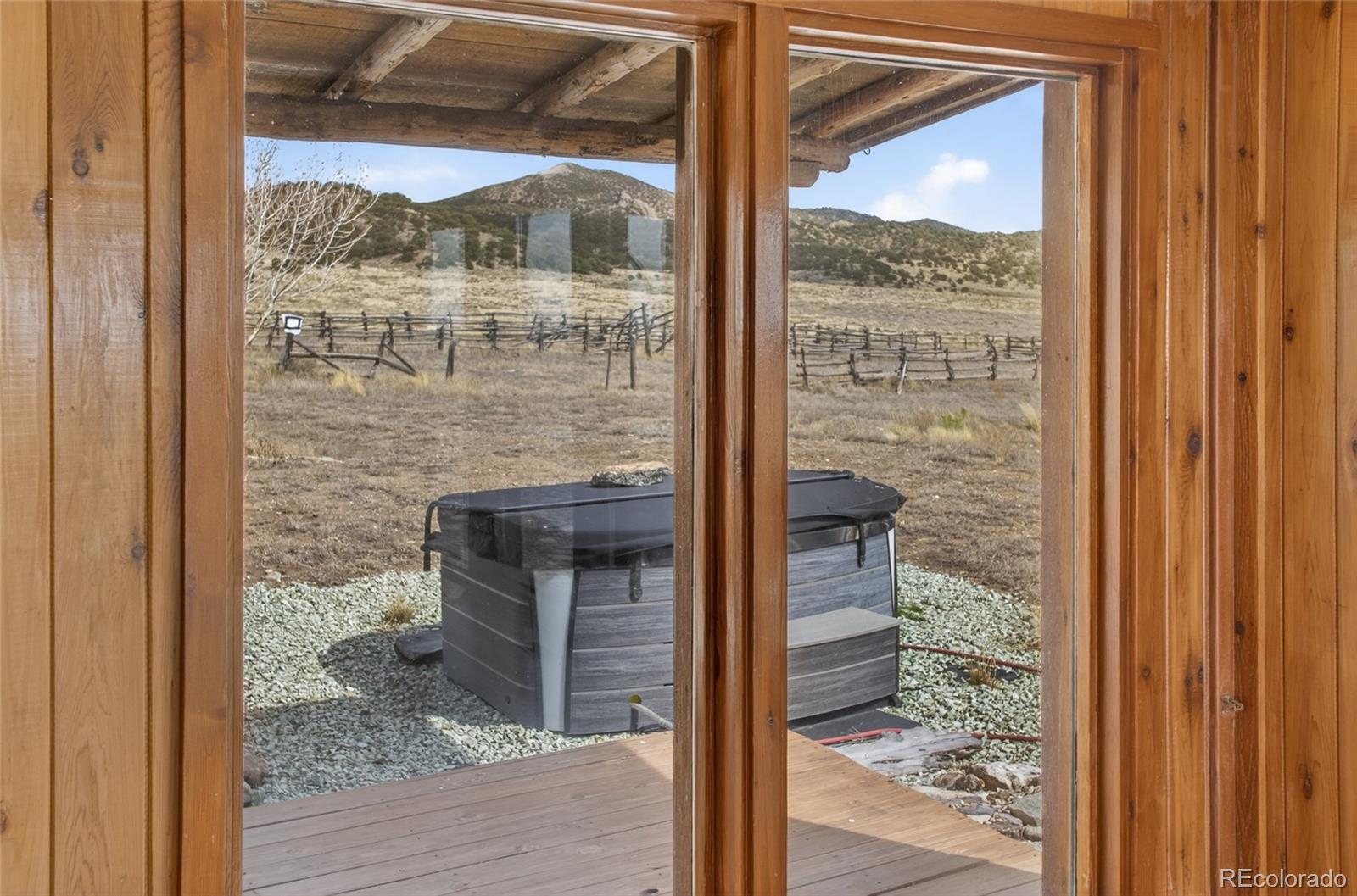 34425 County Road Alamosa, CO 81101 - Photo 15 of 34 a bathroom with a glass door