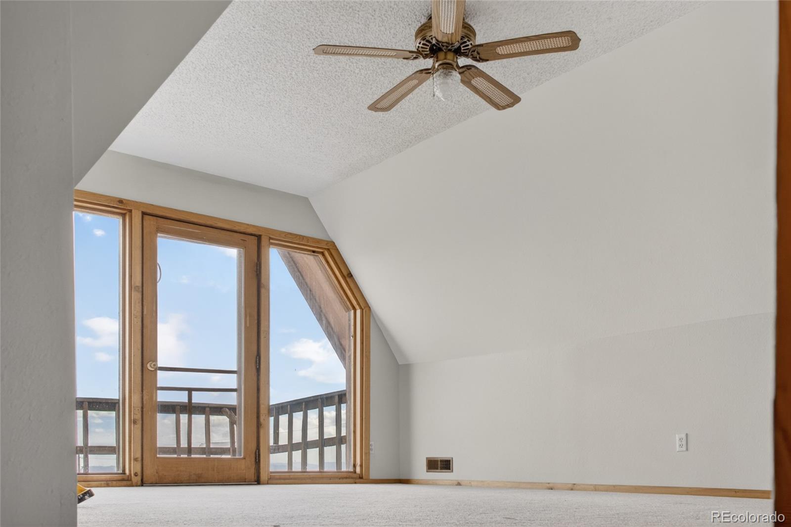 34425 County Road Alamosa, CO 81101 - Photo 27 of 34 a view of wooden floor in a room