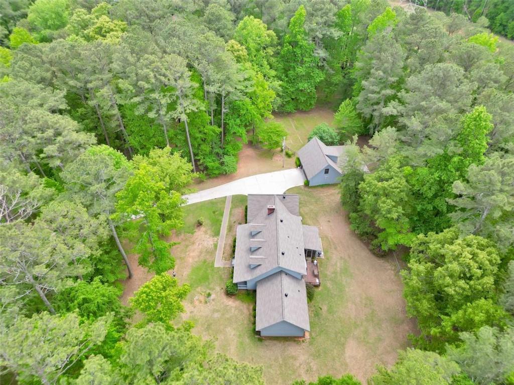 314 Winding Stream Trail Southwest Conyers, GA 30094 - Photo 59 of 59 an aerial view of a house with a yard basket ball court and outdoor seating
