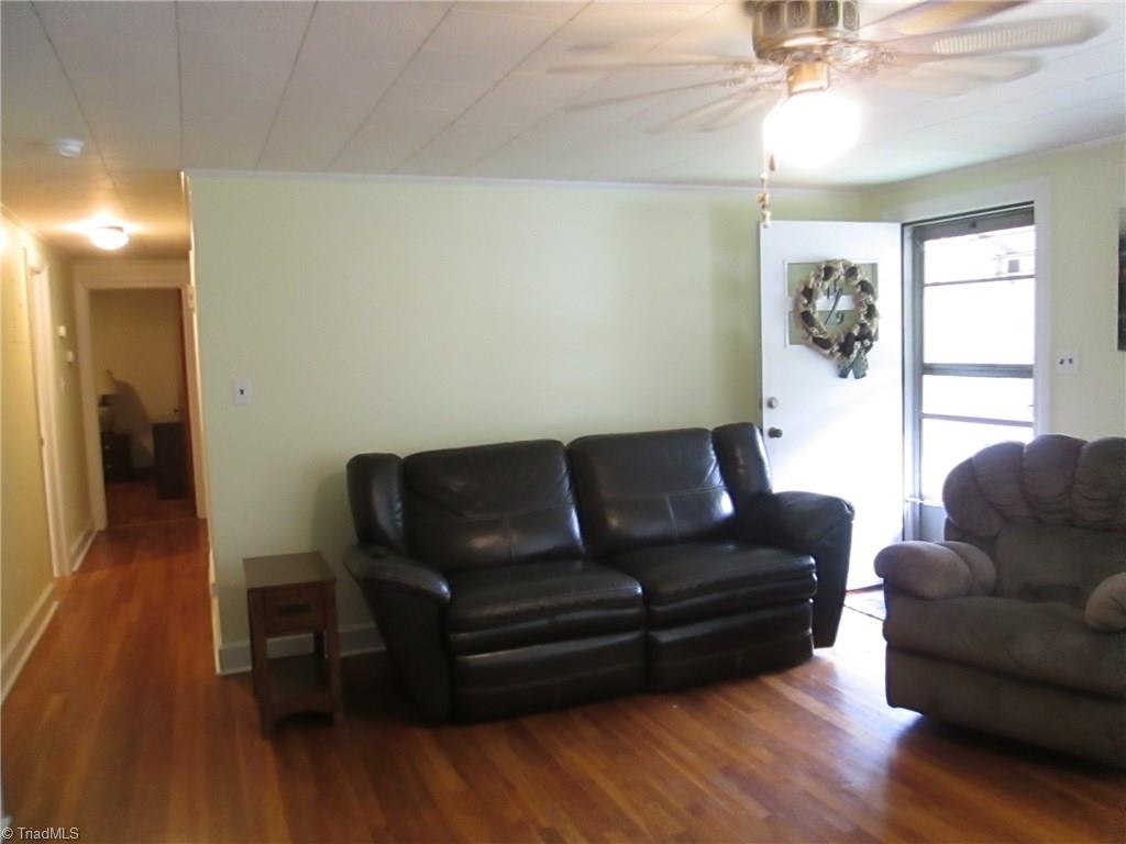 3778 Swicegood Road Linwood, NC 27299 - Photo 12 of 15 living area with hardwood floors