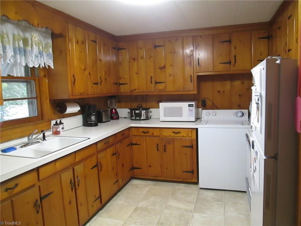 3778 Swicegood Road Linwood, NC 27299 - Photo 5 of 15 Kitchen, look at these cabinets...awesome wood