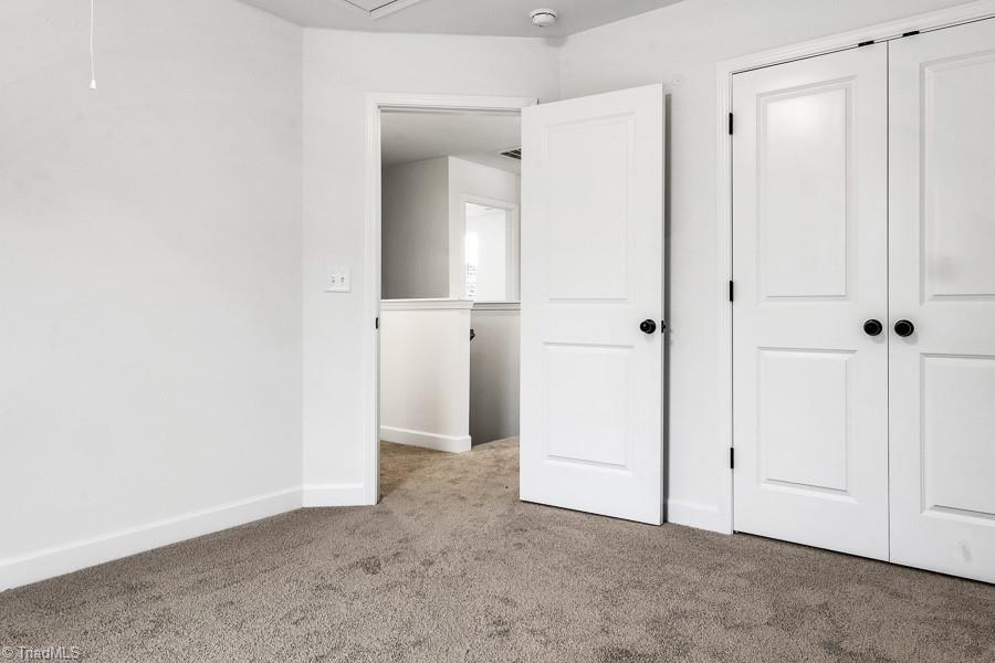 7714 Sedgewick Ridge Road Lewisville, NC 27023 - Photo 29 of 43 Upstairs Bedroom 1