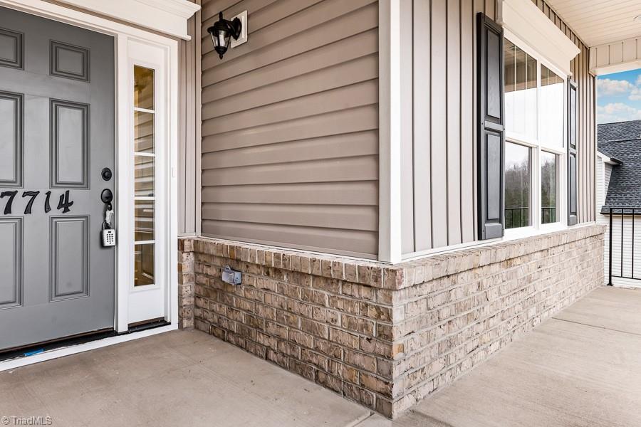 7714 Sedgewick Ridge Road Lewisville, NC 27023 - Photo 4 of 43 Welcoming Front Porch